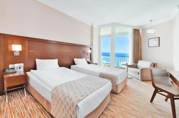 Salamis Bay Conti Resort Hotel & Casino ファマグスタ 部屋 写真 A typical hotel room